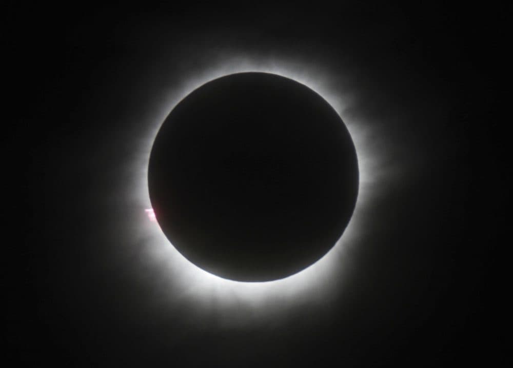 This March 9, 2016 file photo shows a total solar eclipse in Belitung, Indonesia. Wyoming state tourism officials say the solar eclipse passing over the entire length of Wyoming in August could give the state economy a much needed boost. (AP)