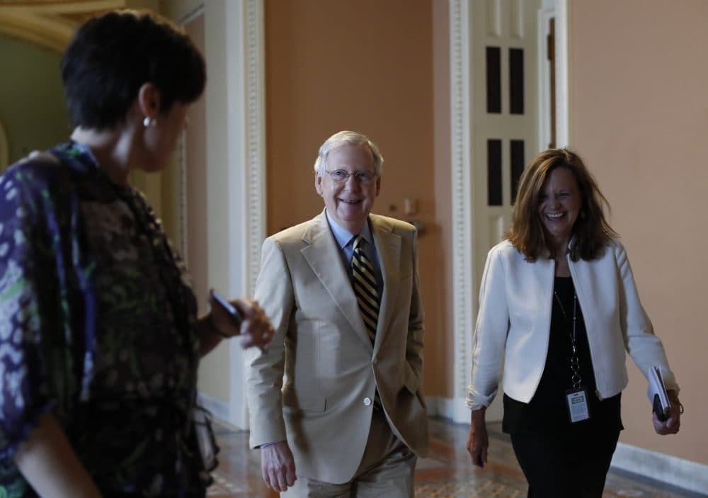 Senate Majority Leader Mitch McConnell (R-Ky.), center, talks with his chief of staff Sharon Soderstrom, right, and communications staff director Antonia Ferrier, left, as they walk to his office on Capitol Hill in Washington, Monday, June 26, 2017. Senate Republicans unveil a revised health care bill in hopes of securing support from wavering GOP lawmakers, including one who calls the drive to whip his party's bill through the Senate this week &quot;a little offensive.&quot; (Carolyn Kaster/AP)