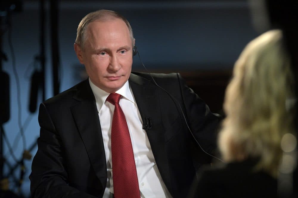 In this Saturday, June 3, 2017, photo released Monday, June 5, 2017, Russian President Vladimir Putin faces an interview with NBC's &quot;Sunday Night with Megyn Kelly&quot; in St. Petersburg, Russia .Putin says claims about Russian involvement in U.S. elections are untrue, and says the United States actively interferes with elections in other countries. (Alexei Druzhinin, Sputnik, Kremlin Pool Photo via AP)