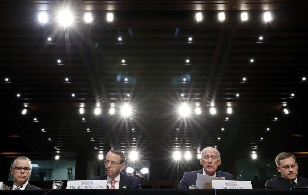 FBI Acting Director Andrew McCabe, left, Deputy Attorney General Rod Rosenstein, Director of National Intelligence Dan Coats, and National Security Agency director Adm. Mike Rogers are seated during a Senate Intelligence Committee hearing about the Foreign Intelligence Surveillance Act, on Capitol Hill, Wednesday, June 7, 2017, in Washington. (Alex Brandon/AP)