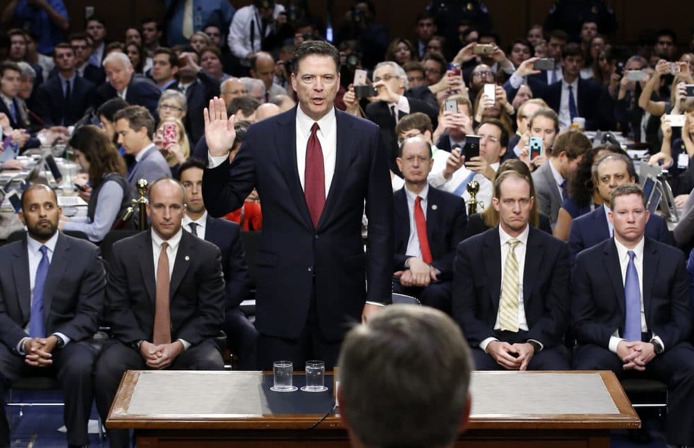 Former FBI Director James Comey is sworn in during a Senate Intelligence Committee hearing on Capitol Hill Thursday. (Alex Brandon/AP)