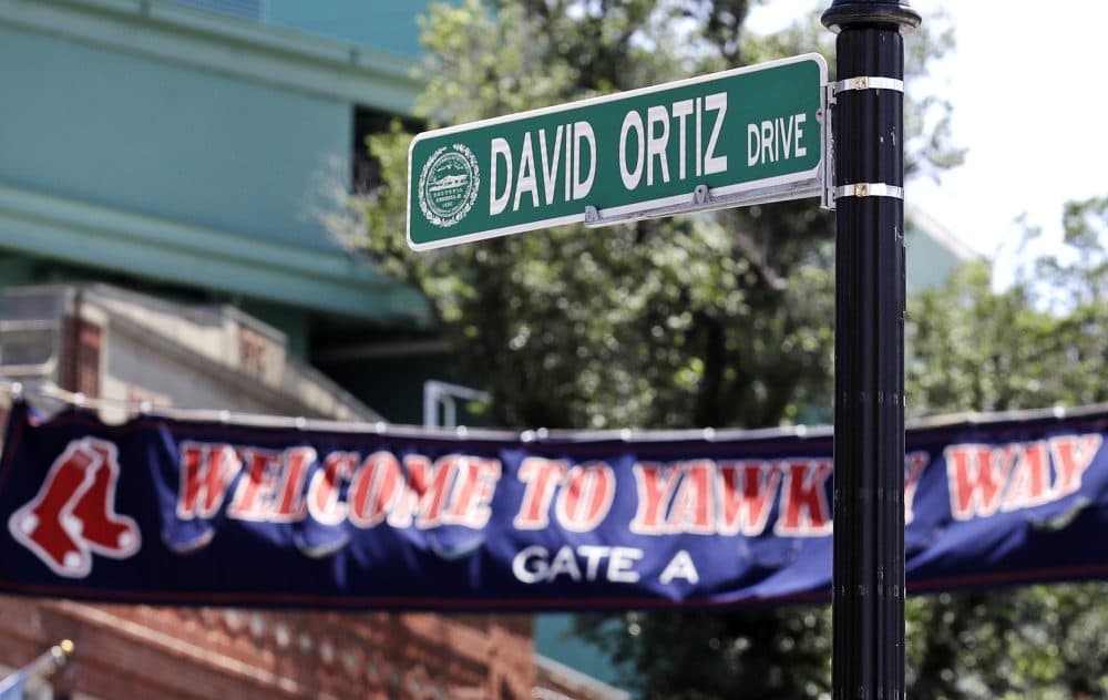 A new &quot;David Ortiz Drive&quot; street sign is posted outside Fenway Park after a ceremony Thursday where part of Yawkey Way was renamed in the slugger's honor. (Charles Krupa/AP)