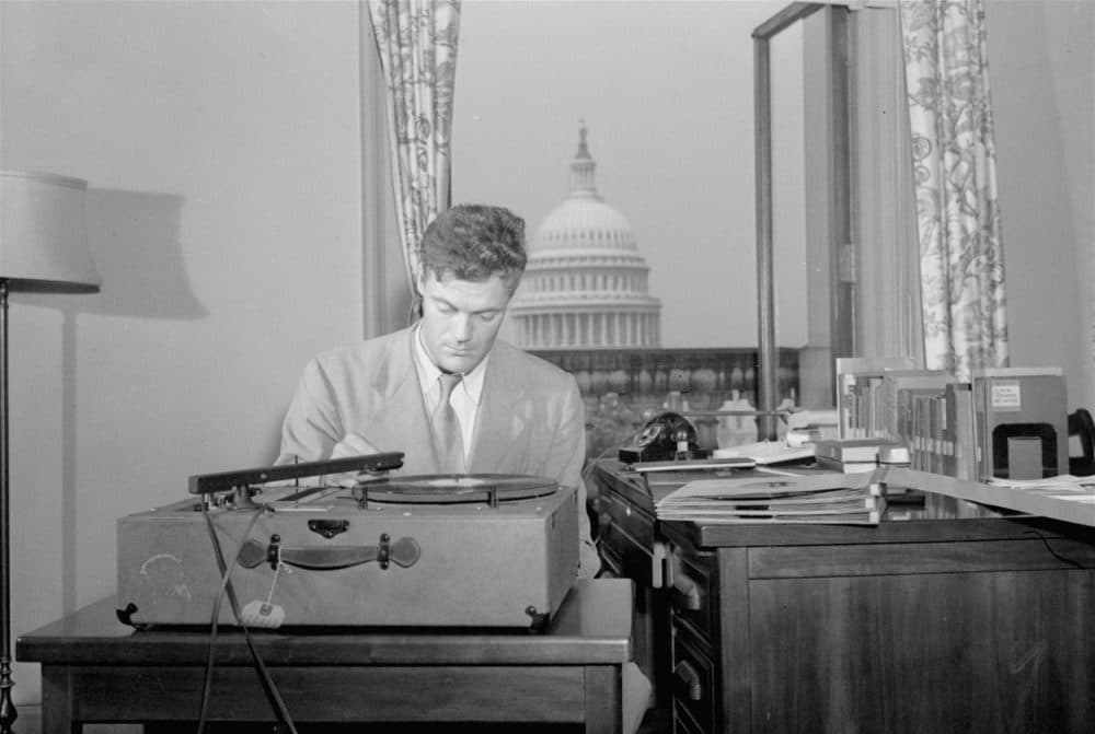 Robert Lowell, Jr., Library of Congress consultant in poetry in English, listens to a playback of a new recording of poetry in his office in Washington, DC, August 31, 1948.  Lowell is supervising the preparation of a series of recordings of contemporary poetry in a project made possible by a grant of funds by the Bollingen Foundation to the Library.  (AP Photo)