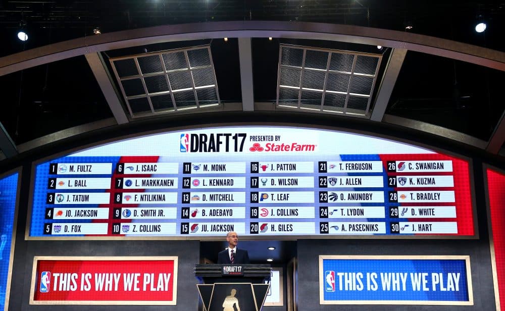 NEW YORK, NY - JUNE 22: NBA Commissioner speaks as the draft board is seen displaying picks 1 through 30 after the first round of the 2017 NBA Draft at Barclays Center on June 22, 2017 in New York City. NOTE TO USER: User expressly acknowledges and agrees that, by downloading and or using this photograph, User is consenting to the terms and conditions of the Getty Images License Agreement.  (Photo by Mike Stobe/Getty Images)