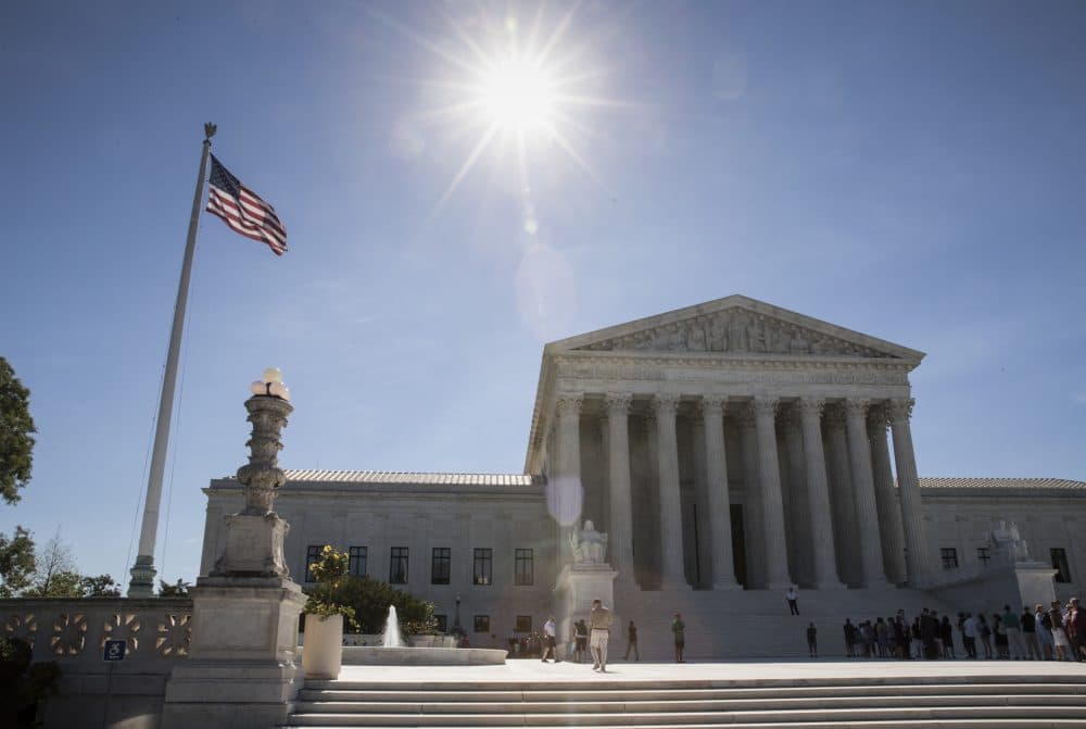 The Supreme Court court is letting a limited version of the Trump administration ban on travel from six mostly Muslim countries take effect. (J. Scott Applewhite/AP)