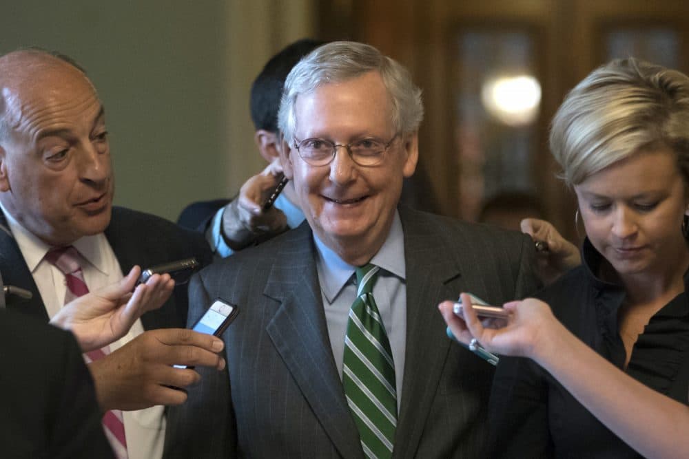 Senate Majority leader Mitch McConnell smiles as he leaves the chamber after announcing the release of the Republicans' healthcare bill which represents the party's long-awaited attempt to scuttle much of President Barack Obama's Affordable Care Act, at the Capitol in Washington, Thursday, June 22, 2017. (J. Scott Applewhite/AP)