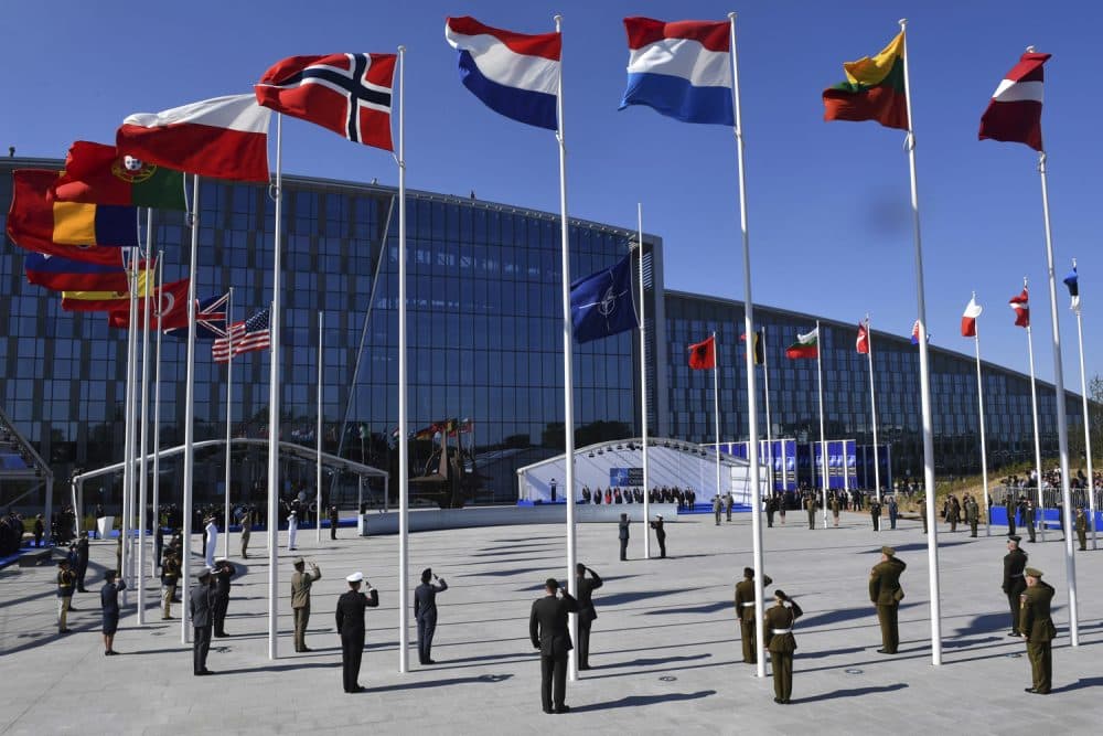 Flags of NATO member countries flutter during a handover ceremony at the NATO summit in Brussels on Thursday, May 25, 2017.
(Geert Vanden Wijngaert, Pool/AP)