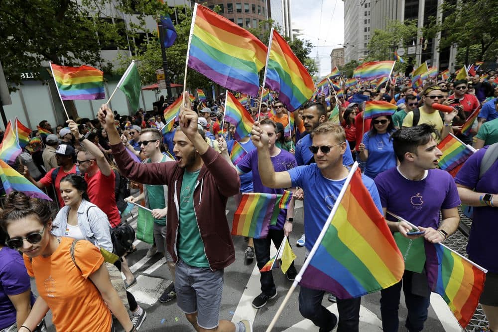 A group of marchers walk at the Pride parade in San Francisco, Sunday, June 25, 2017. (Jeff Chiu/AP)