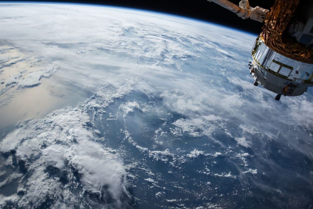 An estimated 400 million people watched the internationally broadcast documentary, marking the largest &quot;shared&quot; experience in history until that point. Julie Wittes Schlack looks at its ripples and implications for today's world. (NASA)