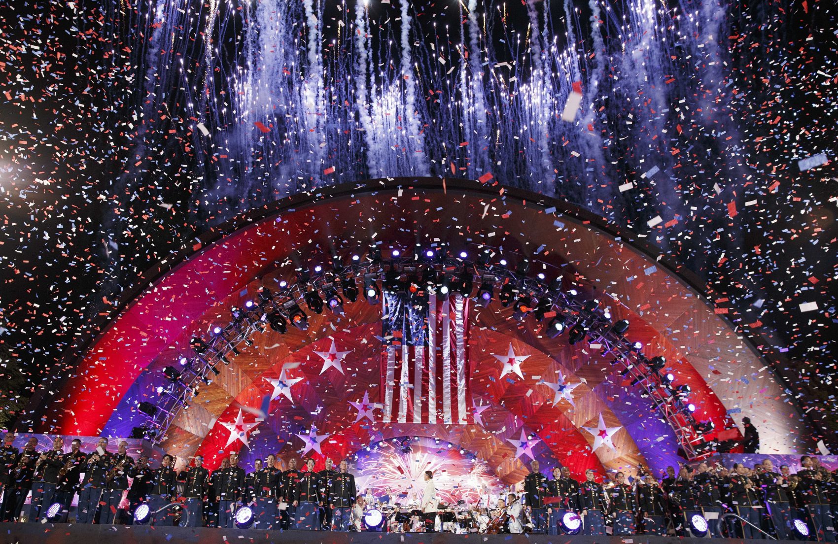 Confetti falls on the Hatch Shell during a rehearsal for the annual Boston Pops Fireworks Spectacular on the Esplanade on July 3 in Boston. (Michael Dwyer/AP)