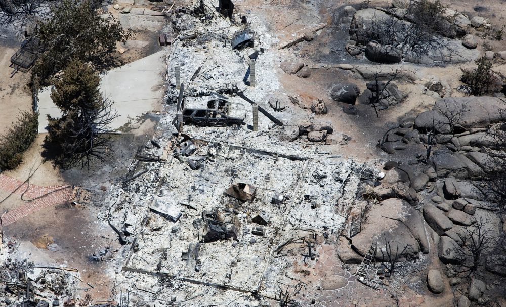 This aerial photo shows Yarnell, Ariz. on Wednesday, July 3, 2013, in the aftermath of the Yarnell Hill Fire that claimed the lives of 19 members of an elite firefighting crew. (Tom Tingle/AP)