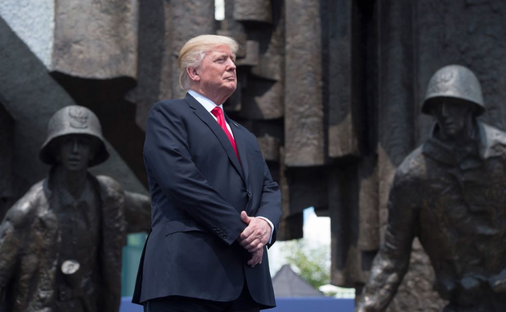 President Donald Trump stands in front of the Warsaw Uprising Monument on Krasinski Square during the Three Seas Initiative Summit in Warsaw, Poland, July 6, 2017. Poland is Trump's first stop on his trip to Europe. (Saul Loeb/AFP/Getty Images)