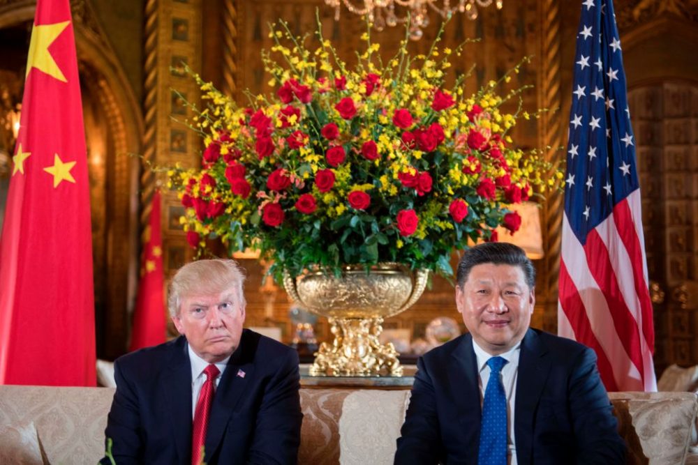 U.S. President Donald Trump (left) sits with Chinese President Xi Jinping during a bilateral meeting at the Mar-a-Lago estate in West Palm Beach, Florida, on April 6, 2017. (Jim Watson/AFP/Getty Images)