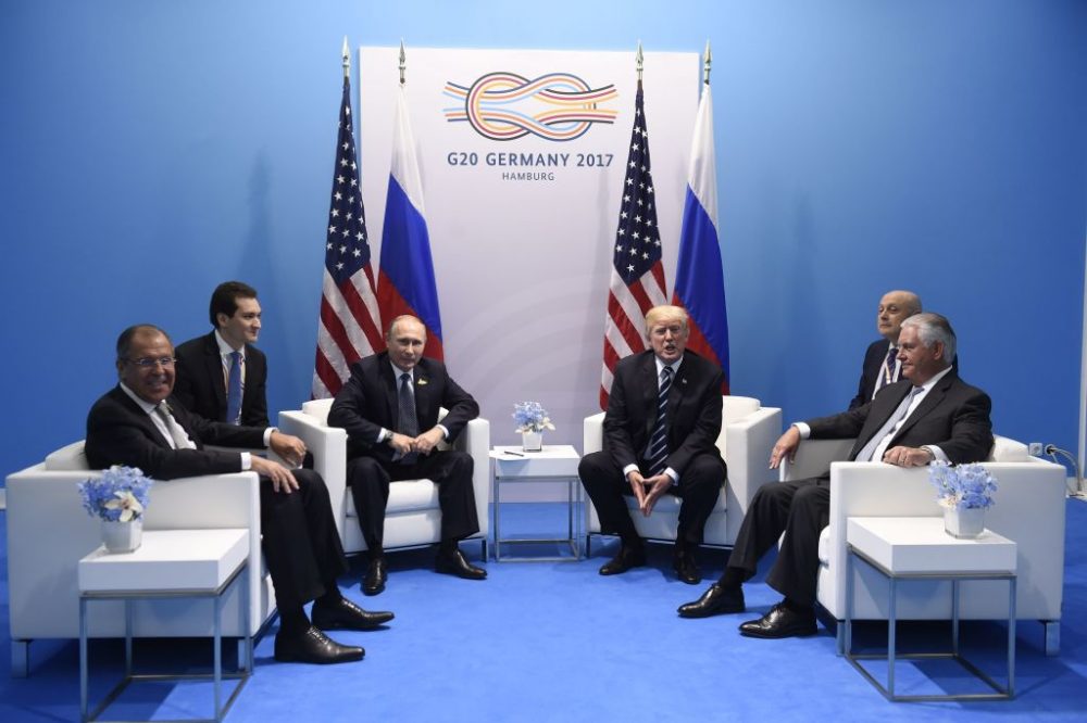 U.S. President Donald Trump (center right) and Russia's President Vladimir Putin (center left) hold a meeting on the sidelines of the G-20 Summit in Hamburg, Germany, on July 7, 2017. (Saul Loeb/AFP/Getty Images)