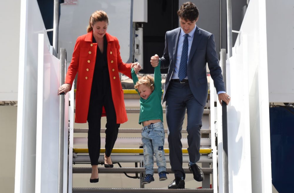 Canadian Prime Minister Justin Trudeau (right), his wife Sophie Gregoire and his son Hadrian arrive at the airport in Hamburg, northern Germany on July 6, 2017 to attend the G-20 summit. (Christof Stache/AFP/Getty Images)