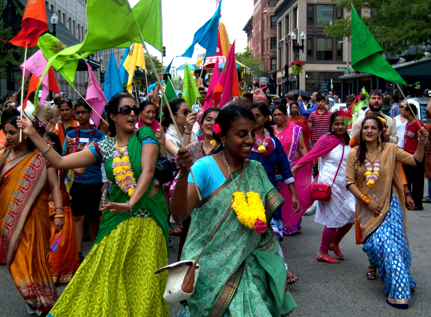 Dancing down Boston's Boylston Street during the Festival of Chariots — or Ratha Yatra. (Greg Cook/WBUR)