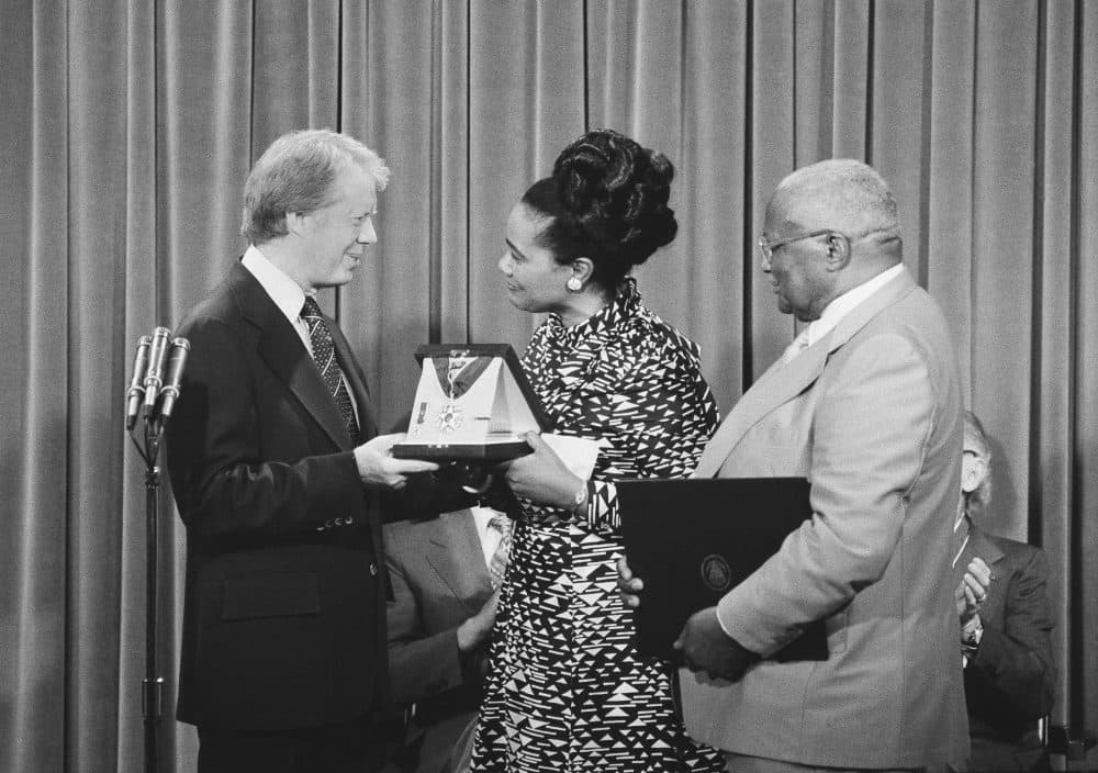 President Jimmy Carter, left, presents the Medal of Freedom Award to Mrs. Coretta King, wife of the late Dr. Martin Luther King, during a ceremony at the White House Iin Washington on, July 11, 1977. (AP)