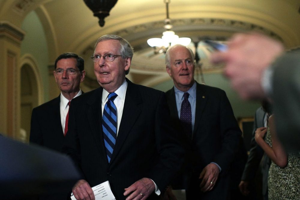 U.S. Senate Majority Leader Sen. Mitch McConnell (R-Ky.) (center), Sen. John Barrasso (R-Wyo.) (left), and Senate Majority Whip Sen. John Cornyn (R-Texas) approach the podium for a news briefing after the weekly Senate Republican Policy Luncheon July 11, 2017 at the Capitol in Washington. (Alex Wong/Getty Images)