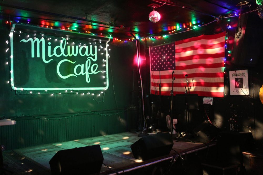 The stage at the Midway Cafe in Boston's Jamaica Plain. (Hadley Green for WBUR)