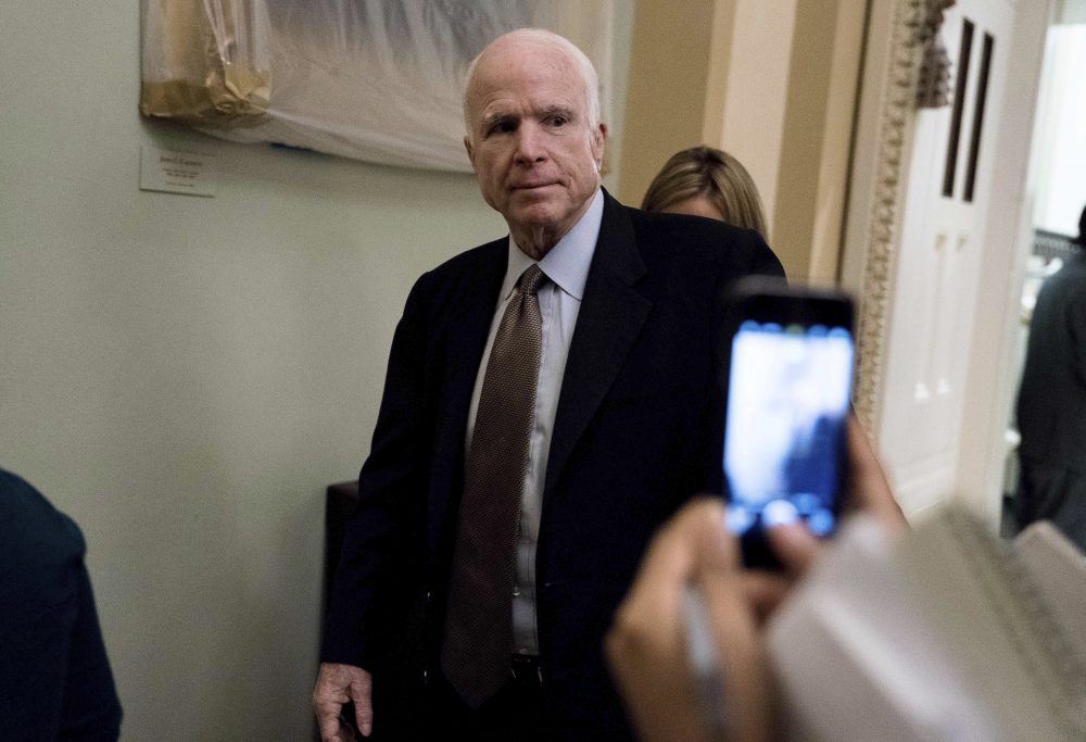 Sen. John McCain, R-Ariz., departs a Senate Republican meeting on a health reform bill on Capitol Hill in Washington on June 22. (Andrew Harnik/AP)