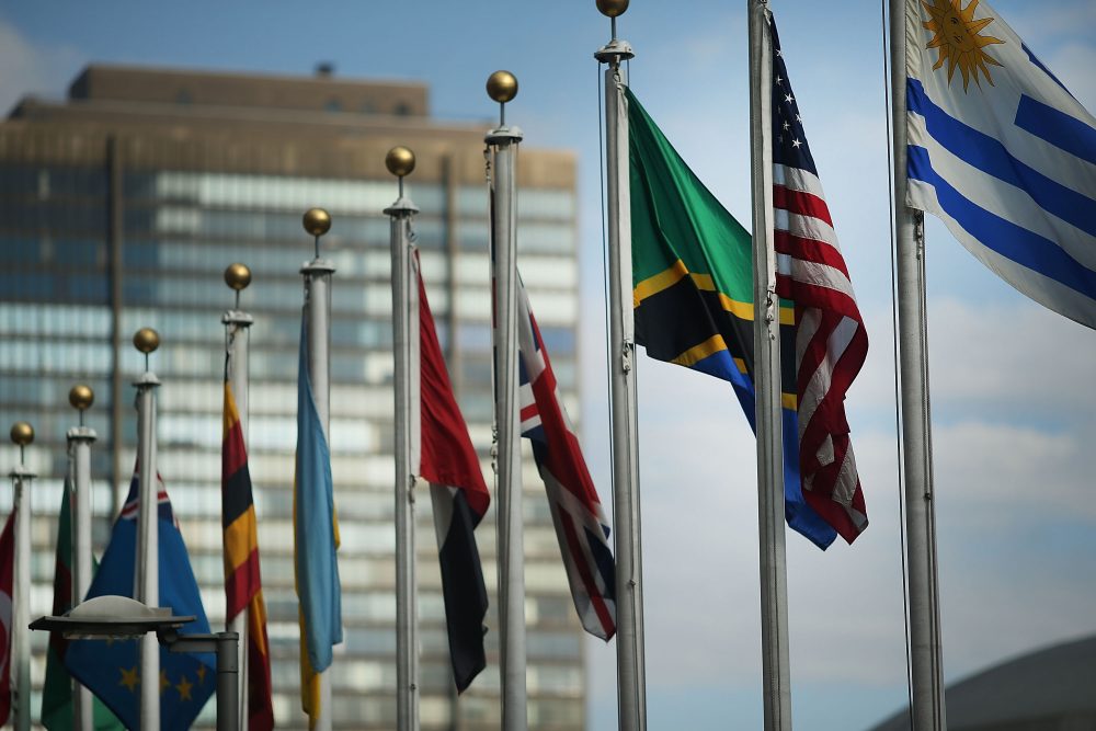 The American flag flies with other nations' flags outside the United Nations in New York. (Spencer Platt/Getty Images)