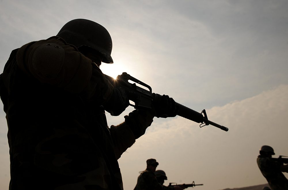 Afghan soldiers, armed with U.S.-made M-16 rifles, take part in combat training in 2009. (Shah Marai/AFP/Getty Images)