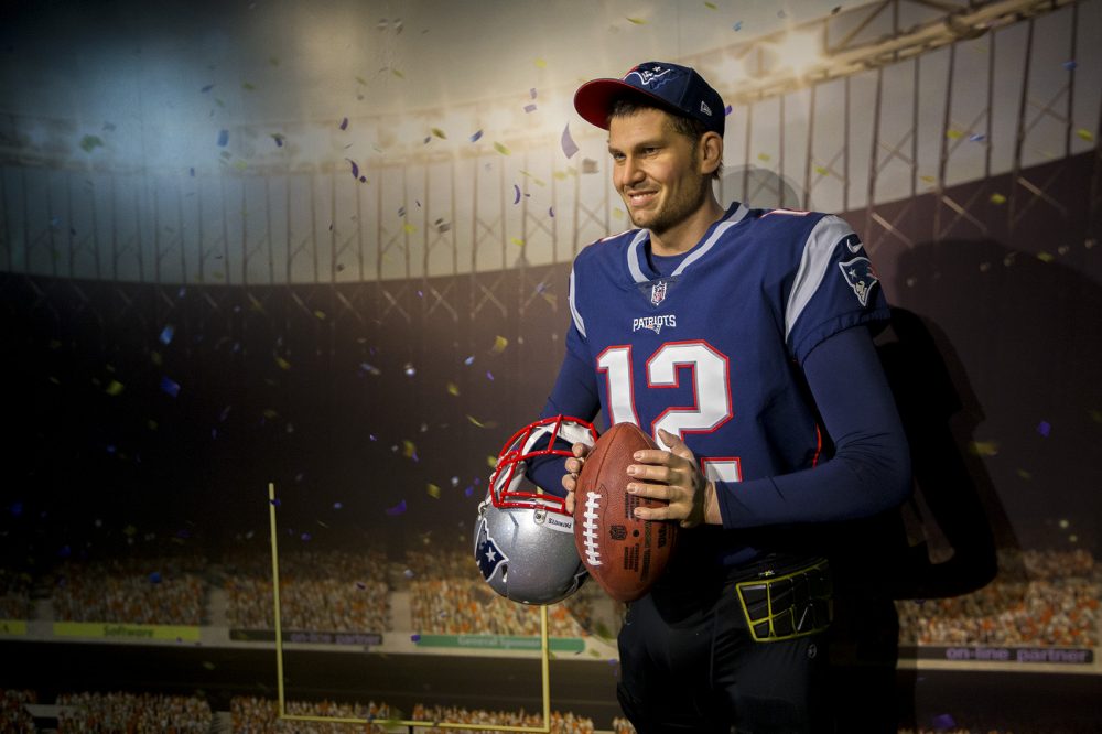 Patriots quarterback Tom Brady will have a cellphone charger nearby at the Dreamland Wax Museum. (Jesse Costa/WBUR)
