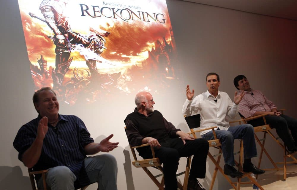 Curt Schilling and other creators behind &quot;Kingdoms of Amalur: Reckoning,&quot; the only game produced by 38 Studios, participate in a panel discussion in 2011. (Jason DeCrow/AP Images for Electronic Arts)