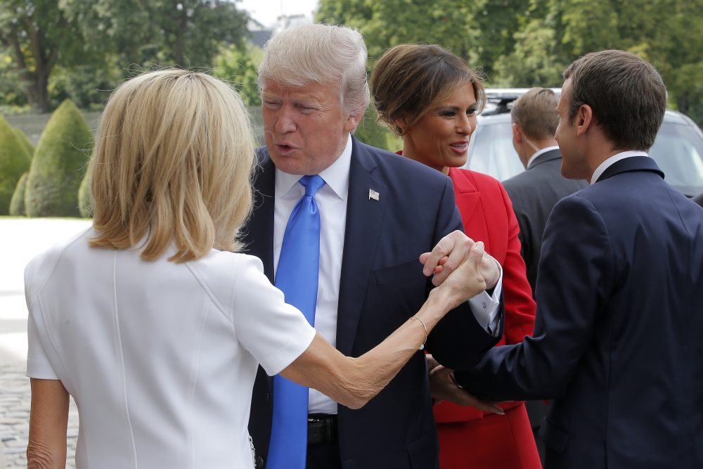 French President Emmanuel Macron, right, welcome First Lady Melania Trump while and his wife Brigitte, left, welcomes U.S President Donald Trump at Les Invalides museum in Paris Thursday, July 13, 2017. President Donald Trump and French President Emmanuel Macron planned to meet Thursday in Paris to focus on issue where they can take U.S.-French relations forward, security and defense issues chief among them. (Michel Euler/AP)