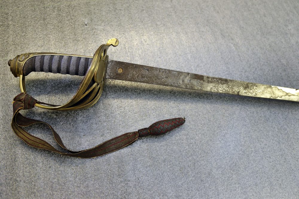 The sword that belonged to Col. Robert Gould Shaw, the commanding officer of the first all-black regiment raised in the North during the Civil War. Stolen after Shaw was killed during the 54th Massachusetts Voluntary Infantry's attack on Fort Wagner, South Carolina in 1863, the sword was recently found in the attic of a Boston-area home. (Elise Amendola/AP)