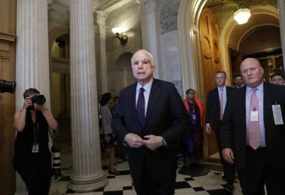 The Senate voted down “repeal” and the GOP’s “repeal and replace” health care plan while teens in Boston caught a major oversight in TD Garden’s operation. All that and more from Tom Keane’s weekly news roundup. Pictured: Sen. John McCain, R-Ariz., who returned to Capitol Hill after being diagnosed with an aggressive type of brain cancer, leaves the chamber after vote the Republican-run Senate rejected a GOP proposal to scuttle Obamacare on Wednesday, July 26, 2017. (J. Scott Applewhite/AP)