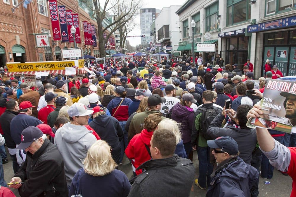 Fans wait in security lines on Yawkey Way to get into Fenway Park on Red Sox 2016 Opening Day. (Joe Difazio for WBUR)