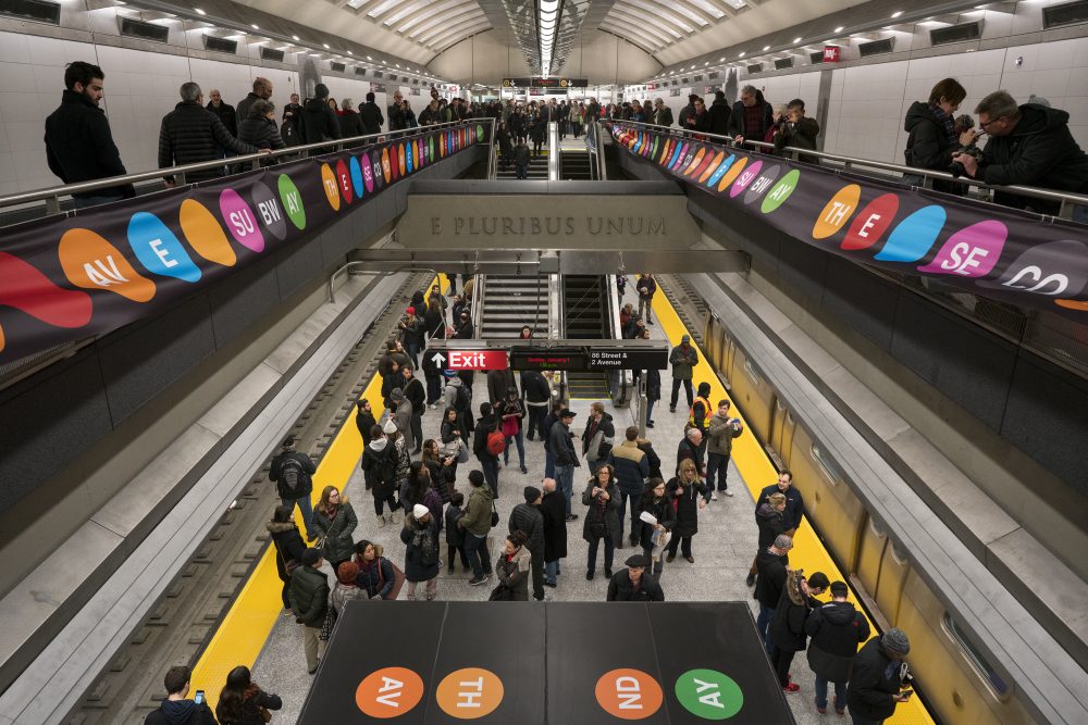 People walk about the newly opened Second Ave. Subway 86th Street station in New York Sunday, Jan. 1, 2017. (Craig Ruttle/AP)