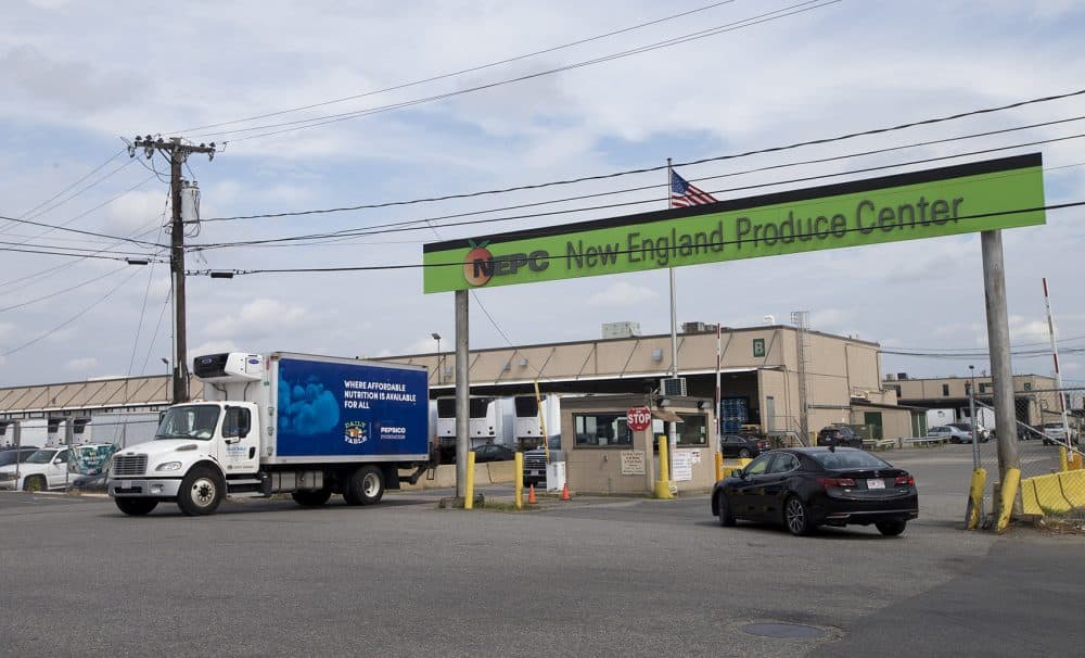 A delivery truck leaves the New England Produce Center in Chelsea. (Jesse Costa/WBUR)