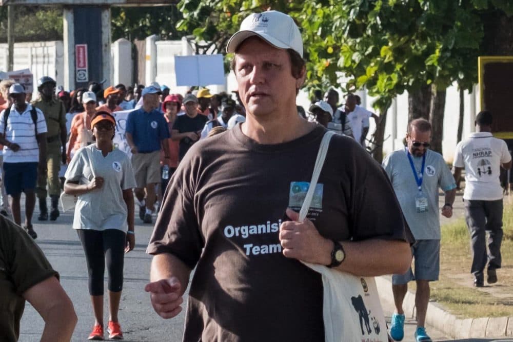 A picture taken on Jan. 14, 2017, shows South African conservationist Wayne Lotter taking part in the Walk for Elephants event endorsed by the Chinese embassy, in Dar es Salaam. Lotter, a leading conservationist who had worked hard to bring down notorious elephant poachers and stop ivory trafficking, has been shot dead in Tanzania, his PAMS foundation said on Aug. 20, 2017. (Daniel Hayduk/AFP/Getty Images)