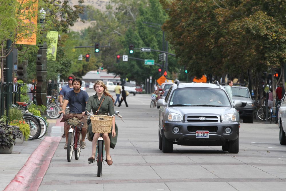Bikers pedal through downtown Boise, Idaho, on Tuesday, Sept. 14, 2010. (Charlie Litchfield/AP)