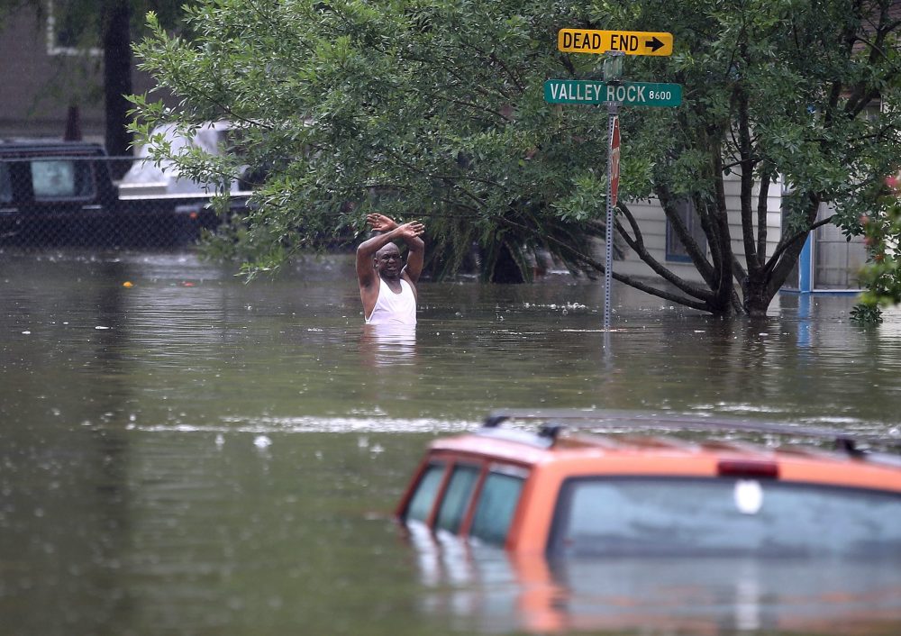 Jennifer and Randy Claridge's home has already been flooded twice before Harvey. Pictured: A man waves down a rescue crew as he tries to leave the area after it was inundated with flooding from Hurricane Harvey on Aug. 28, 2017 in Houston, Texas. (Joe Raedle/Getty Images)