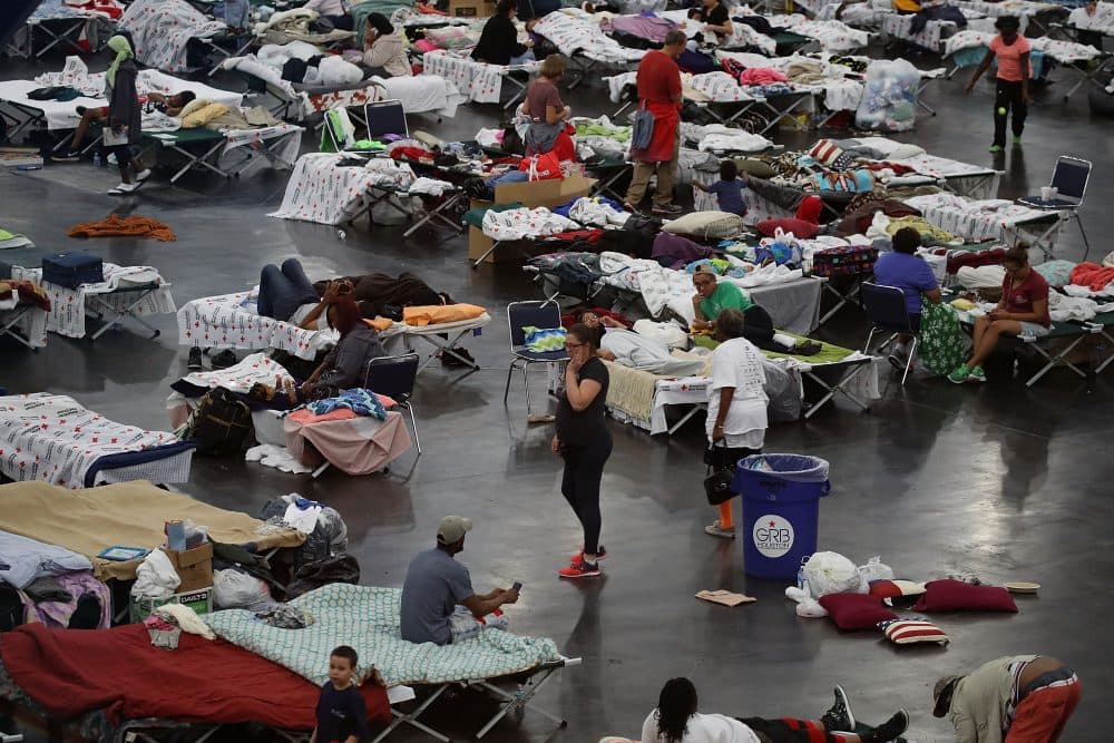 People take shelter at the George R. Brown Convention Center after flood waters from Harvey inundated the city on Aug. 29, 2017 in Houston, Texas. (Joe Raedle/Getty Images)