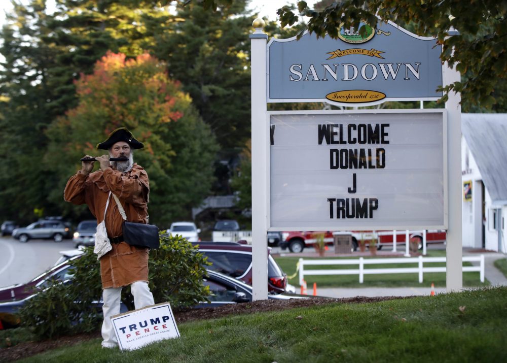 Scott Sturgeon of Plaistow, N.H., plays a fife while awaiting the arrival of Republican presidential candidate Donald Trump at the town hall in Sandown, N.H., Thursday, Oct. 6, 2016. (Robert F. Bukaty/AP)