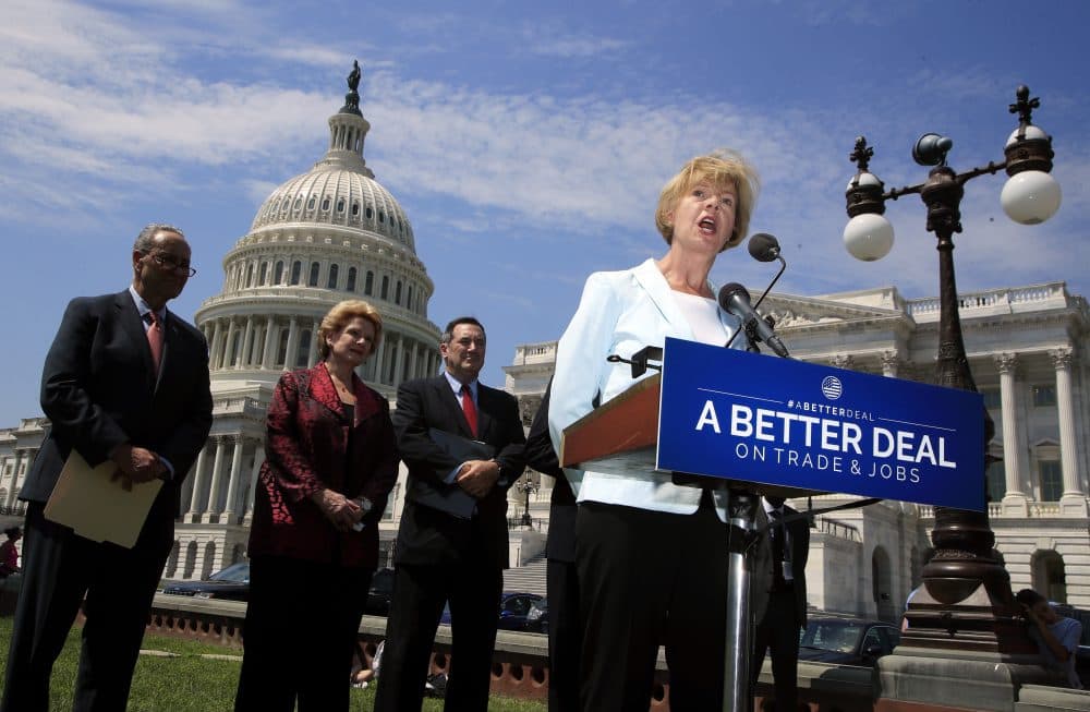 Sen. Tammy Baldwin, D-Wis., right, accompanied by, from left, Senate Minority Leader Chuck Schumer of N.Y., Sen. Debbie Stabenow, D-Mich., and Sen. Bob Casey, D-Pa., speaks on Capitol Hill in Washington, Wednesday, Aug. 2, 2017, to unveil &quot;A Better Deal On Trade and Jobs,&quot; to put American workers first and fight back against companies that outsource jobs and countries that manipulate trade laws. (Manuel Balce Ceneta/AP)