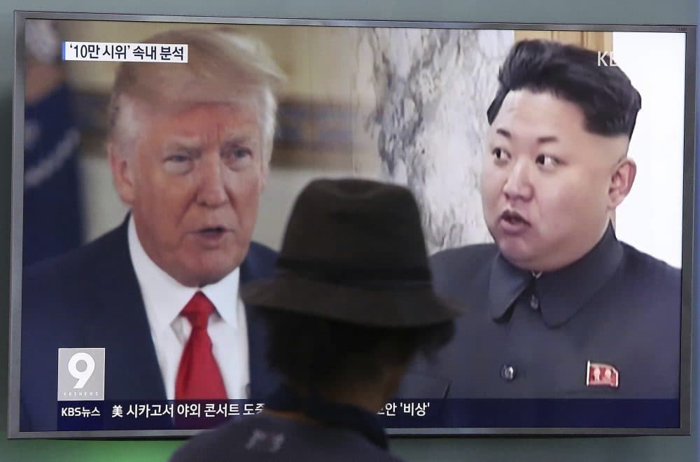 A man watches a television screen showing President Donald Trump and North Korean leader Kim Jong Un during a news program at the Seoul Train Station in Seoul, South Korea, Thursday, Aug. 10, 2017. President Donald Trump issued a new threat to North Korea on Thursday, demanding that Kim Jong Un's government &quot;get their act together&quot; or face extraordinary trouble. He said his previous &quot;fire and fury&quot; warning to Pyongyang might have been too mild. (Ahn Young-joon/AP)