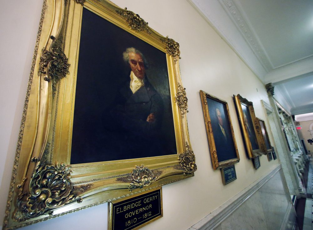 A group of Boston-based mathematicians calling themselves the Metric Geometry and Gerrymandering Group are using their math superpowers to fight back against gerrymandering. Here, a portrait of Massachusetts Gov. Elbridge Gerry hangs in a hallway at the State House in Boston. Gerrymandering is named after Gov. Gerry, who in 1812 signed a bill to redraw the state's district map to benefit his party. (Elise Amendola/AP)