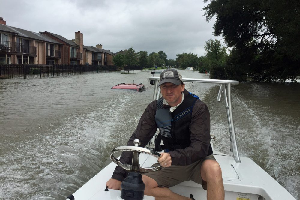 Andrew White pilots his boat while making rescues in Houston in the aftermath of Hurricane Harvey on Tuesday. (Courtesy Andrew White)