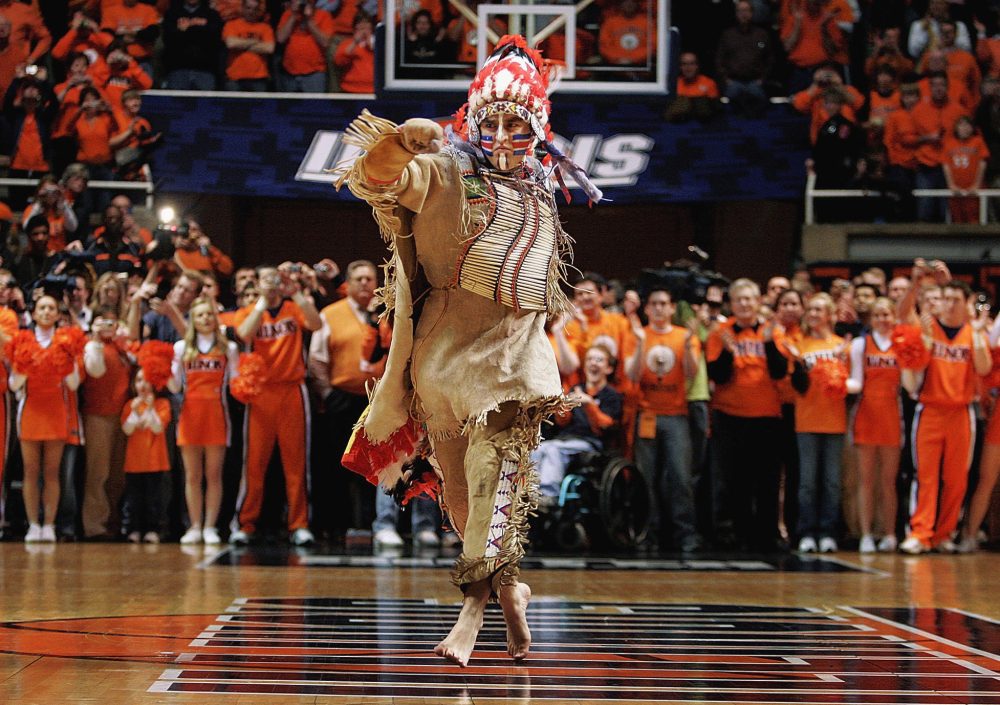 In this Feb. 21, 2007 file photo, University of Illinois mascot Chief Illiniwek performs for the last time during an Illinois basketball game in Champaign, Ill. Illinois says the school is ending its tradition of playing &quot;war chant&quot; music during sporting events. (Seth Perlman/AP)