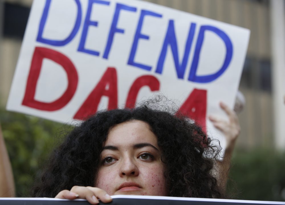 Loyola Marymount University student and DACA recipient Maria Carolina Gomez joins a rally in support of the Deferred Action for Childhood Arrivals, or DACA program outside the Edward Roybal Federal Building in Los Angeles Friday, Sept. 1, 2017. President Donald Trump says he'll be announcing a decision on the fate of hundreds of thousands of young immigrants who were brought into the country illegally as children in the coming days, immigrants he's calling &quot;terrific&quot; and says he loves. (Damian Dovarganes/AP)