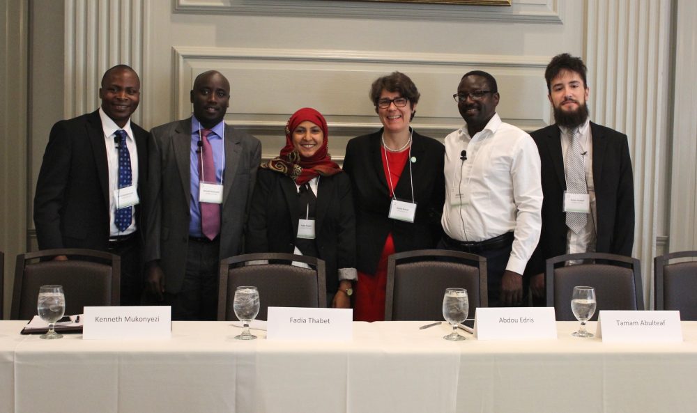 SIT Graduate Institute President Sophia Howlett (center right) stands with SIT's Global Scholars (left to right) Bahati Kanyamanza, Kenneth Mukonyezi, Fadia Thabet, Abdou Edris and Tama Abdulteaf. (Courtesy)
