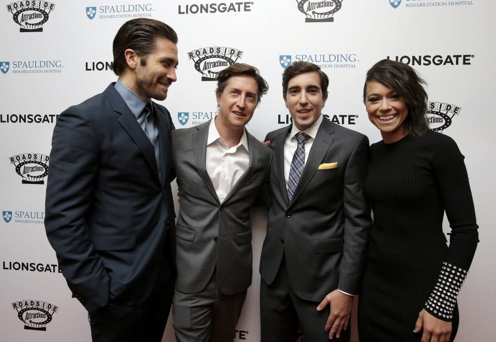 Actor Jake Gyllenhaal, left, director David Gordon Green, center left, Boston Marathon bombing survivor Jeff Bauman, center right, and actress Tatiana Maslany, right, arrive on the red carpet on Tuesday at the U.S. premiere of the movie &quot;Stronger&quot; at the Spaulding Rehabilitation Hospital in Boston. (Steven Senne/AP)