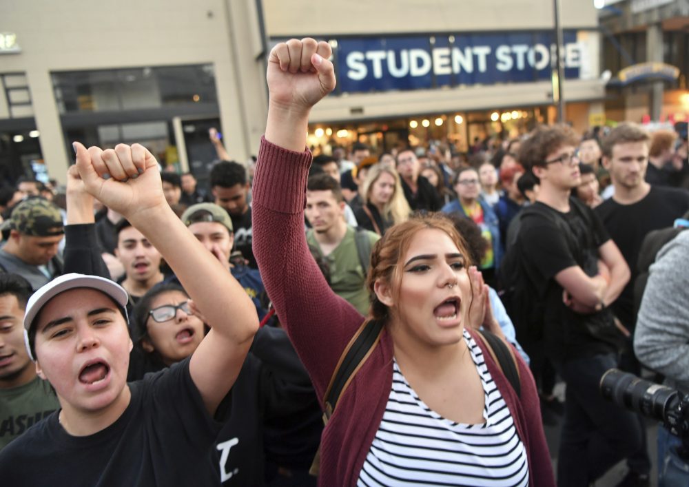 Protesters shout before a speaking engagement by Ben Shapiro on the campus of the University of California Berkeley in Berkeley, Calif., Thursday, Sept. 14, 2017. (Josh Edelson/AP)