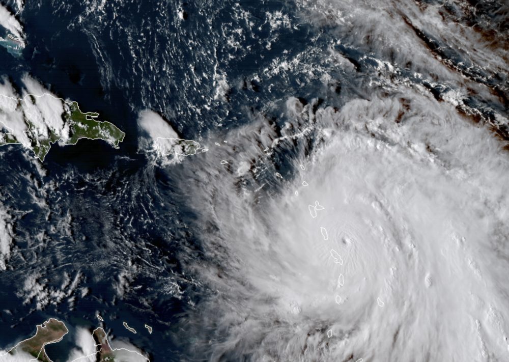 GOES East satellite image provided by NASA taken at 20:30 UTC, shows the eye of Hurricane Maria as it nears Dominica on Monday. (NASA via AP)