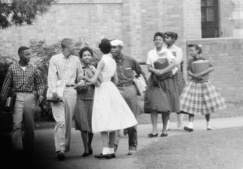 Eight of the nine black students attending Central High School in Little Rock, Ark., are shown as they walked from school to their waiting Army station wagon, Oct. 2, 1957. (Ferd Kaufman/AP)